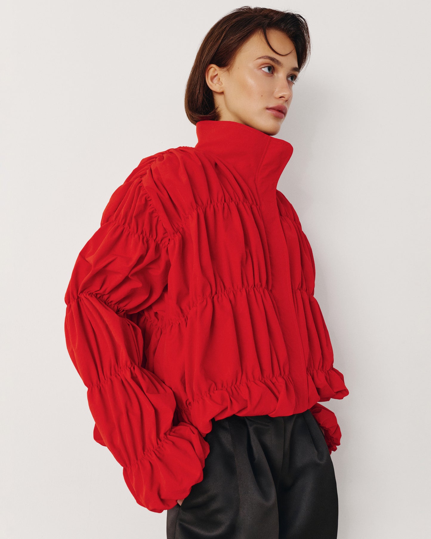 Red draped bomber jacket