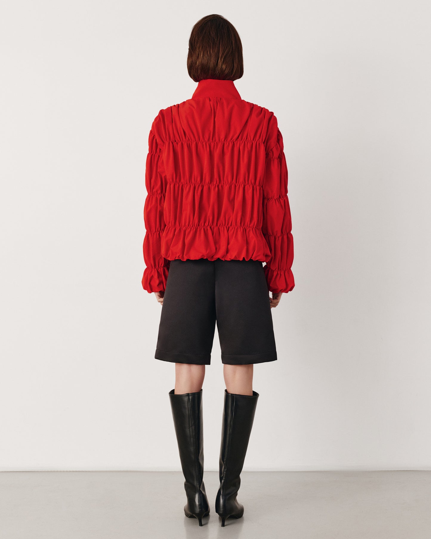 Red draped bomber jacket