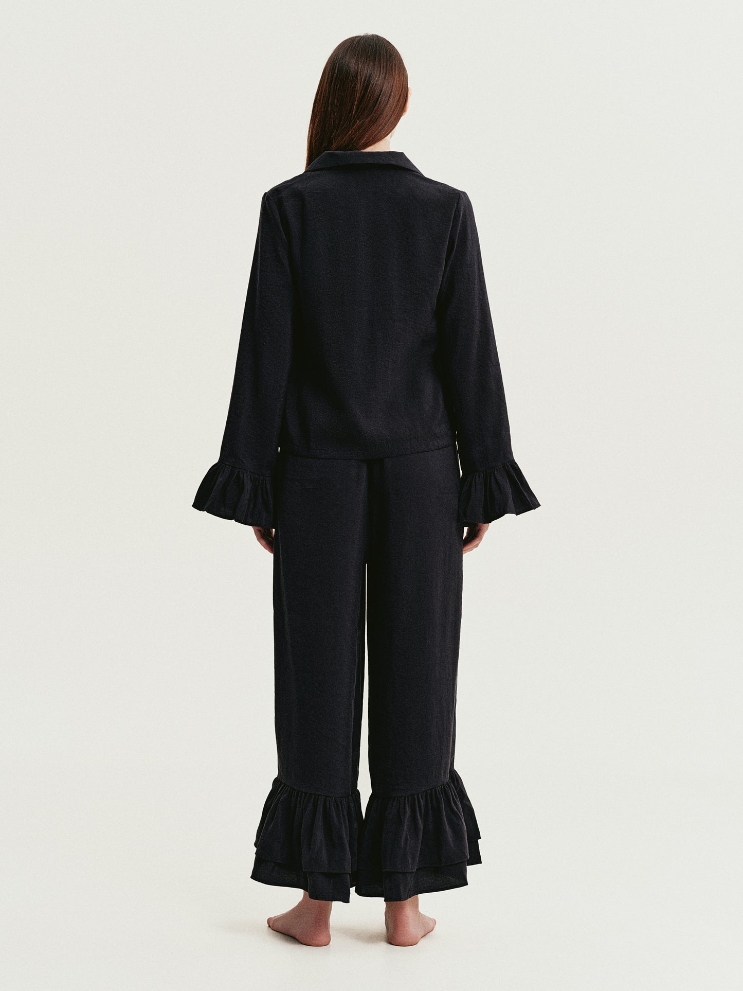 Black blouse with ruffles