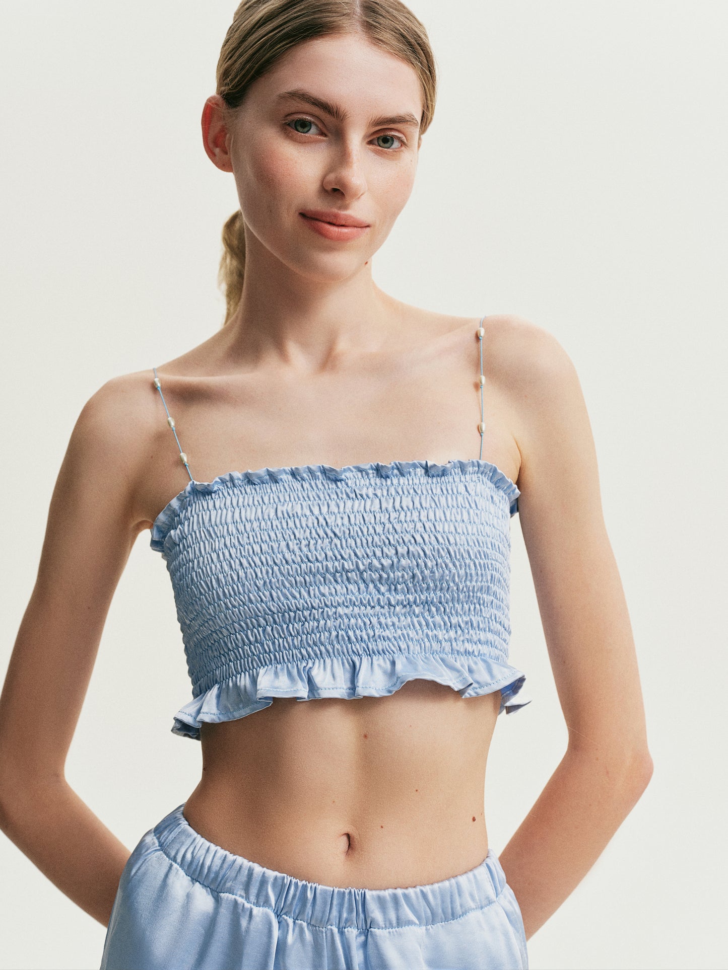 Blue top with pearls