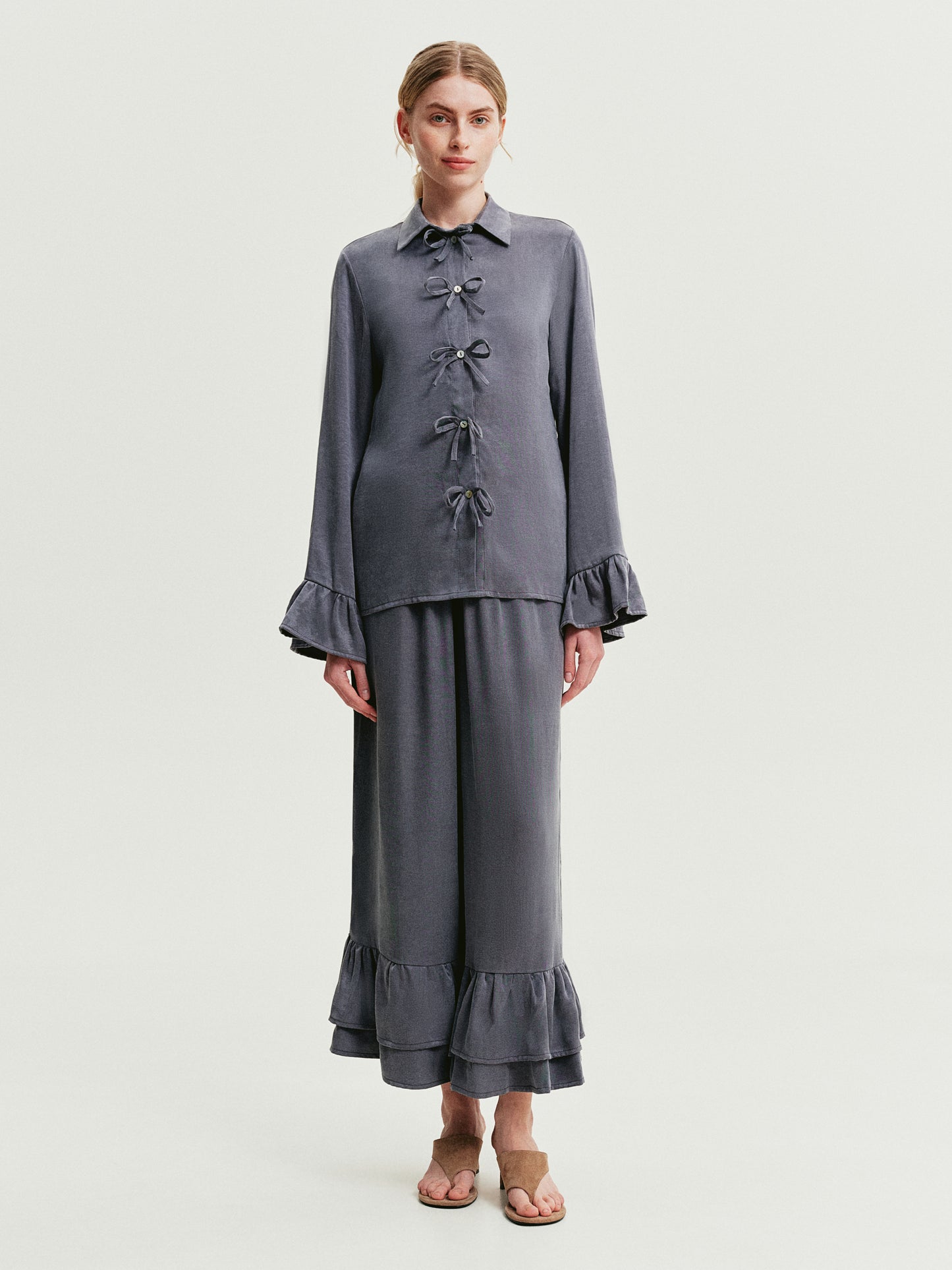 Blue-gray blouse with ruffles