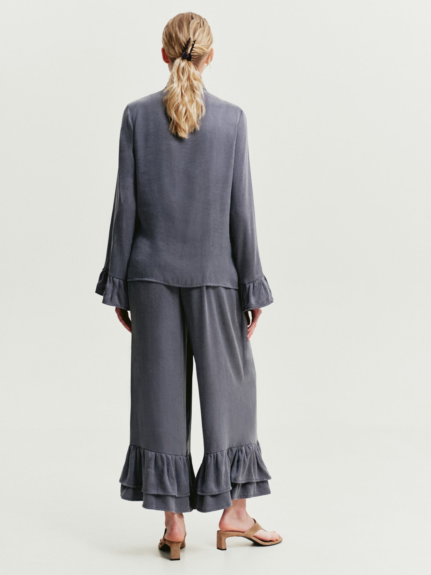 Blue-gray blouse with ruffles