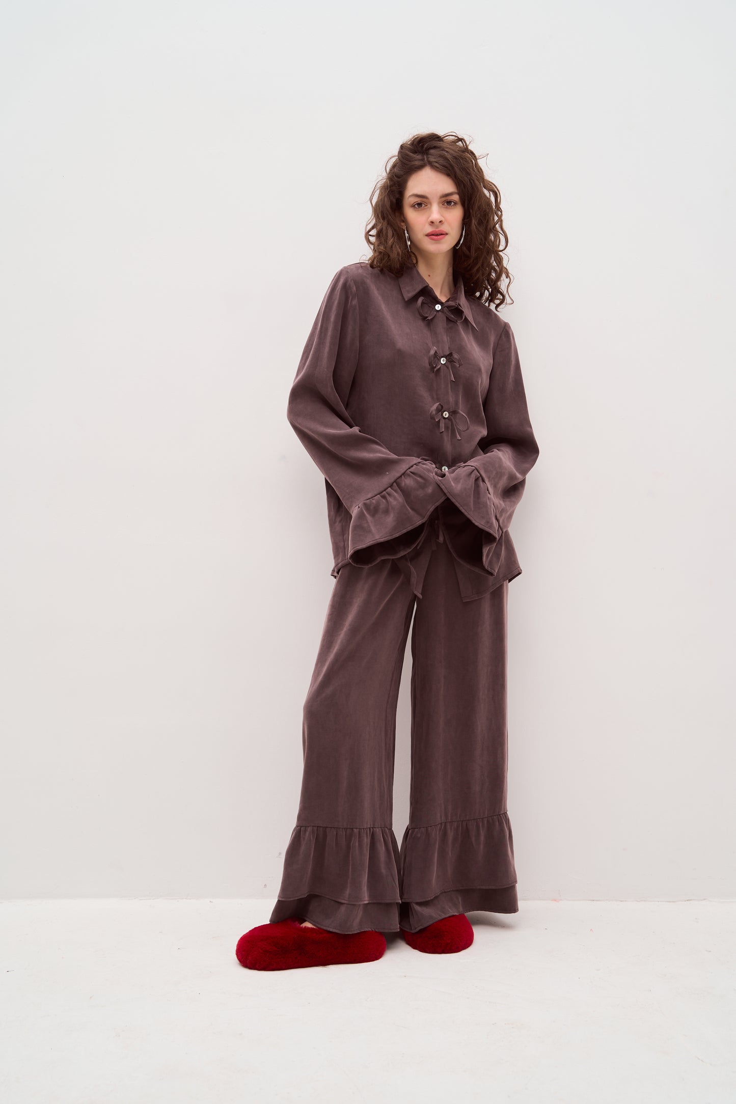 Purple pants with ruffles