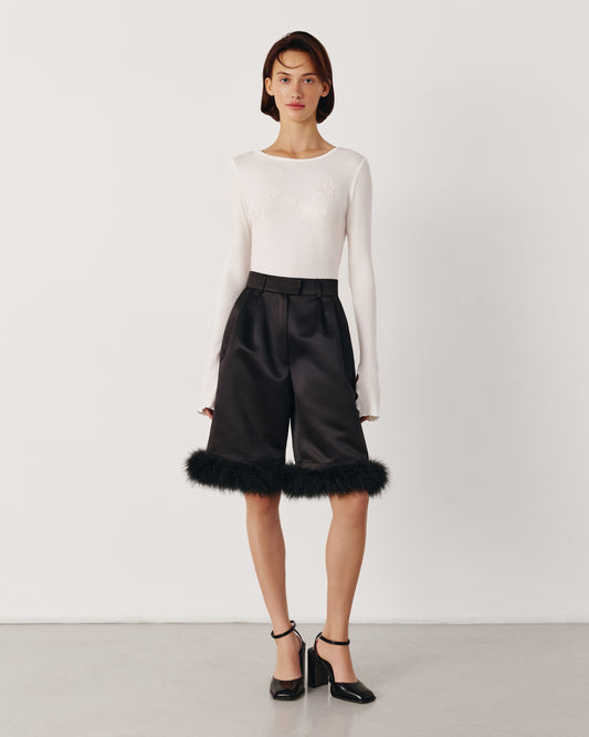 Black Bermuda shorts with puff