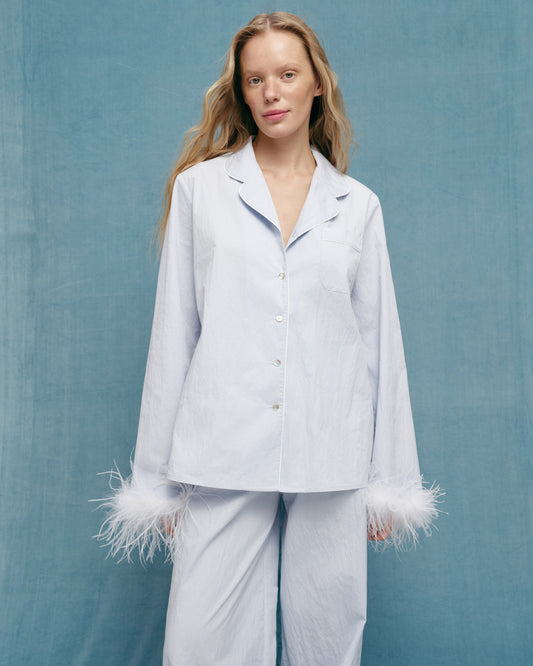 Holiday blouse with feathers in blue colour