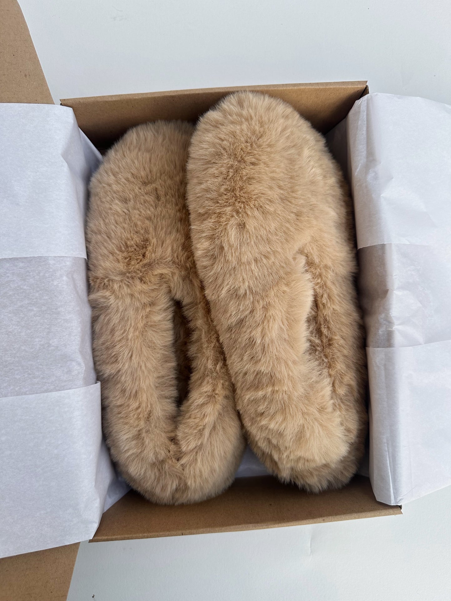 Fluffy beige home slippers