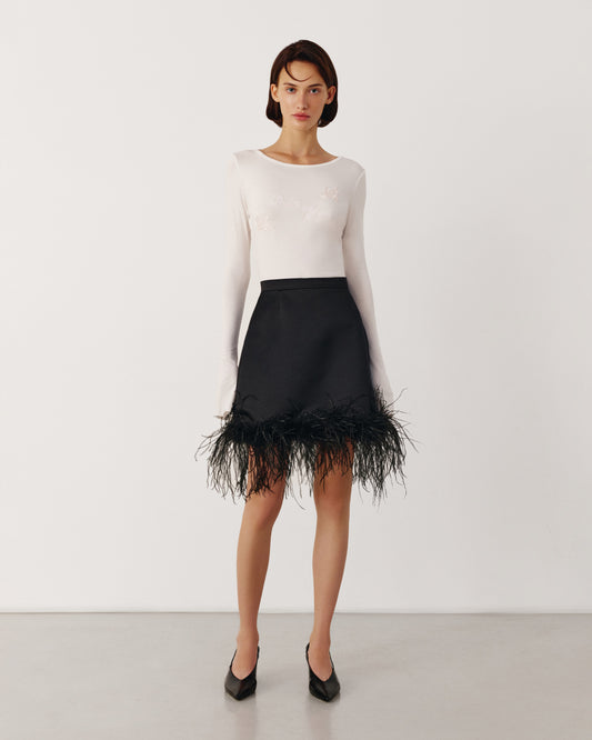 Black satin skirt with feathers