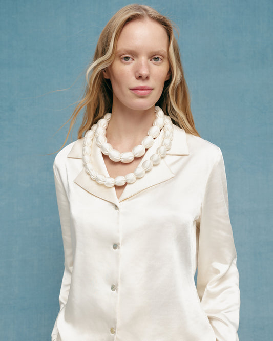 Milky blouse with ruffles