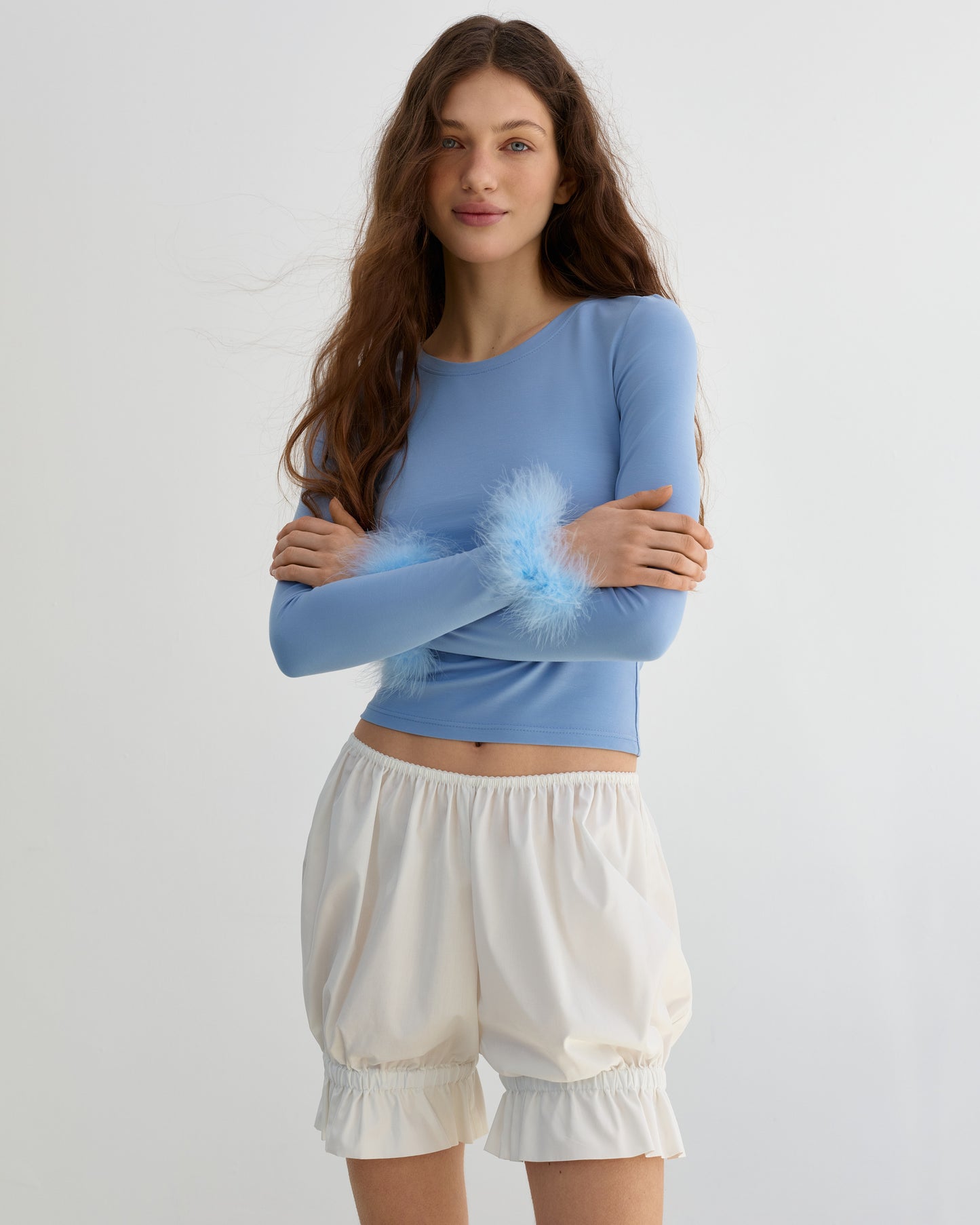 Blue longsleeve with feathers