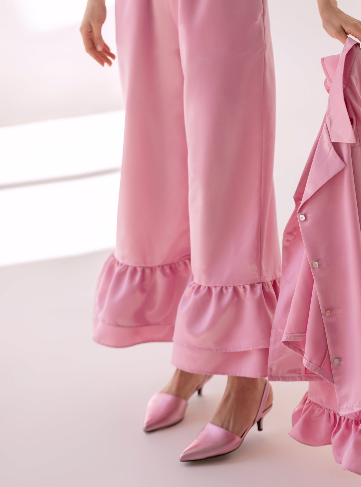 Pink pants with ruffles
